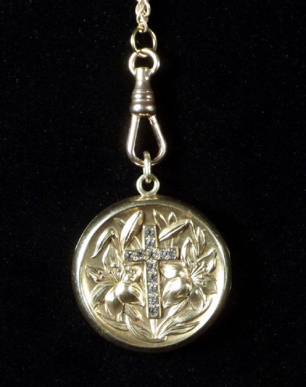 Pendant keychain on a gold chain. Pendant keychain on a gold chain.