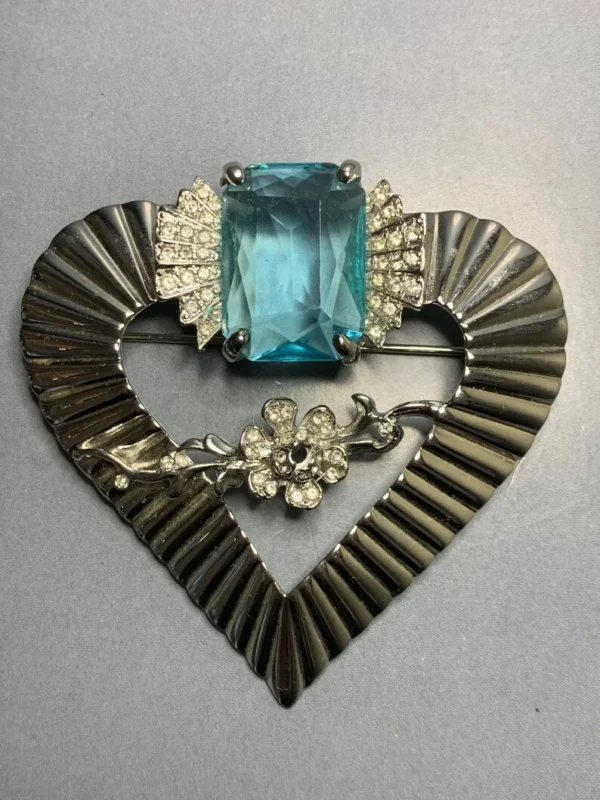Silver corrugated metal heart brooch with rock crystals Silver corrugated metal heart brooch with rock crystals