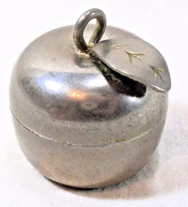 VINTAGE 1970s Revlon Apple Pendant, Silver Tone. VINTAGE 1970s Revlon Apple Pendant, Silver Tone.