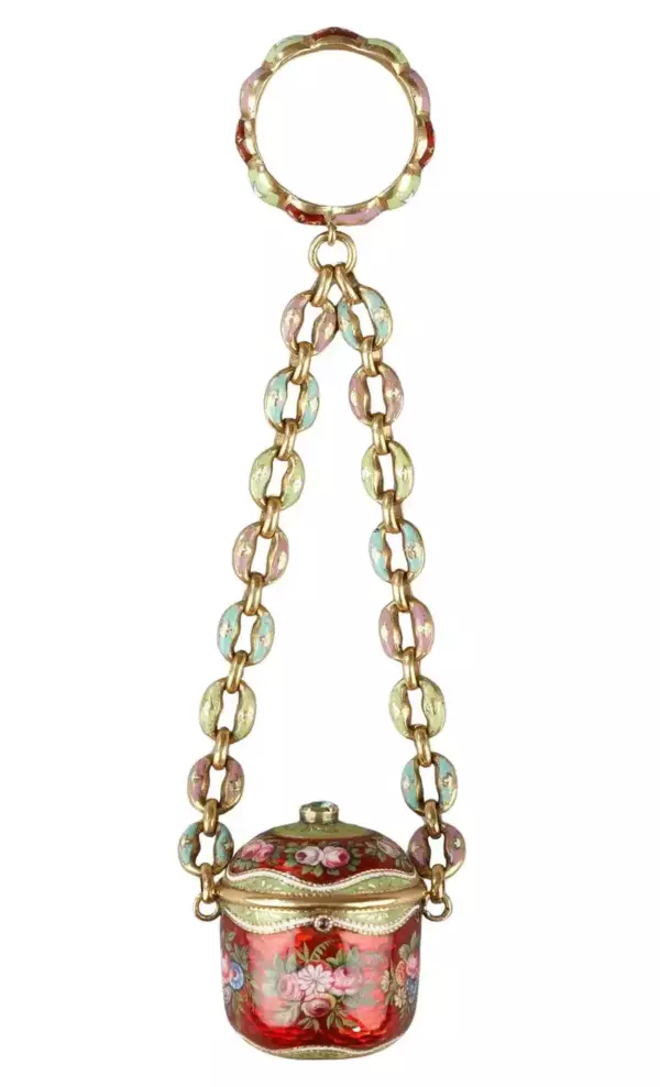 An early 19th century gold and enamel vinaigrette, chain and ring