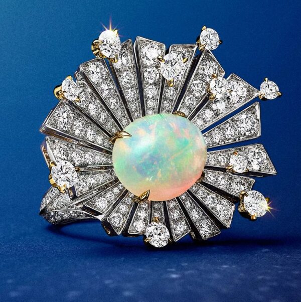 The ring features a clear, untreated opal weighing over 5 carats. The ring features a clear, untreated opal weighing over 5 carats.